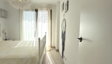 Resa Estates Ibiza longter rental Cala Tarida penthouse bedroom 1.jpeg